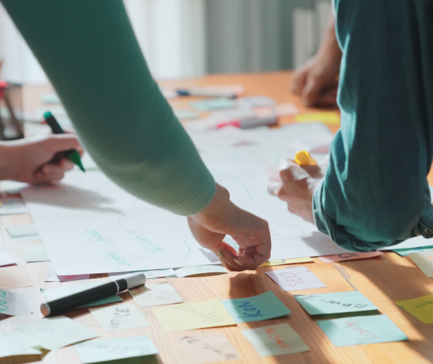 Team brainstorming with post-it notes