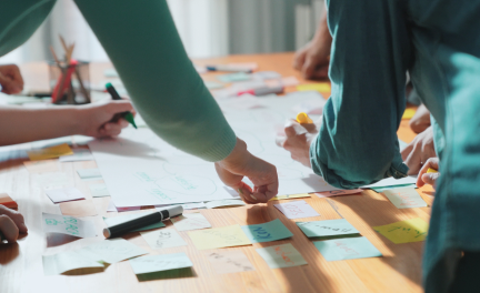 Team brainstorming with post-it notes