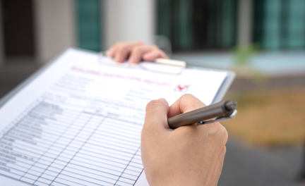 Person holding and checking a list
