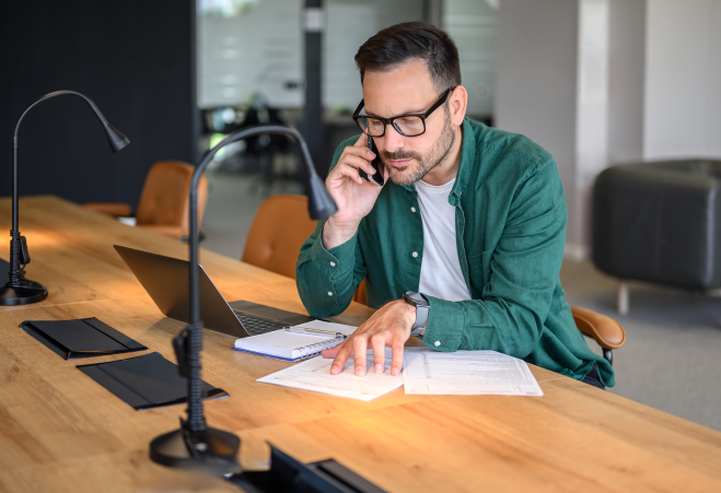man reading a report