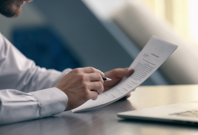man reading a report