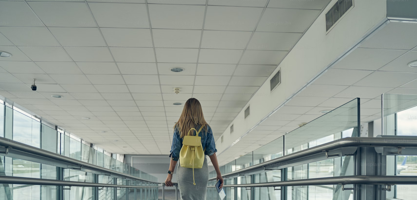 Person walking with luggage