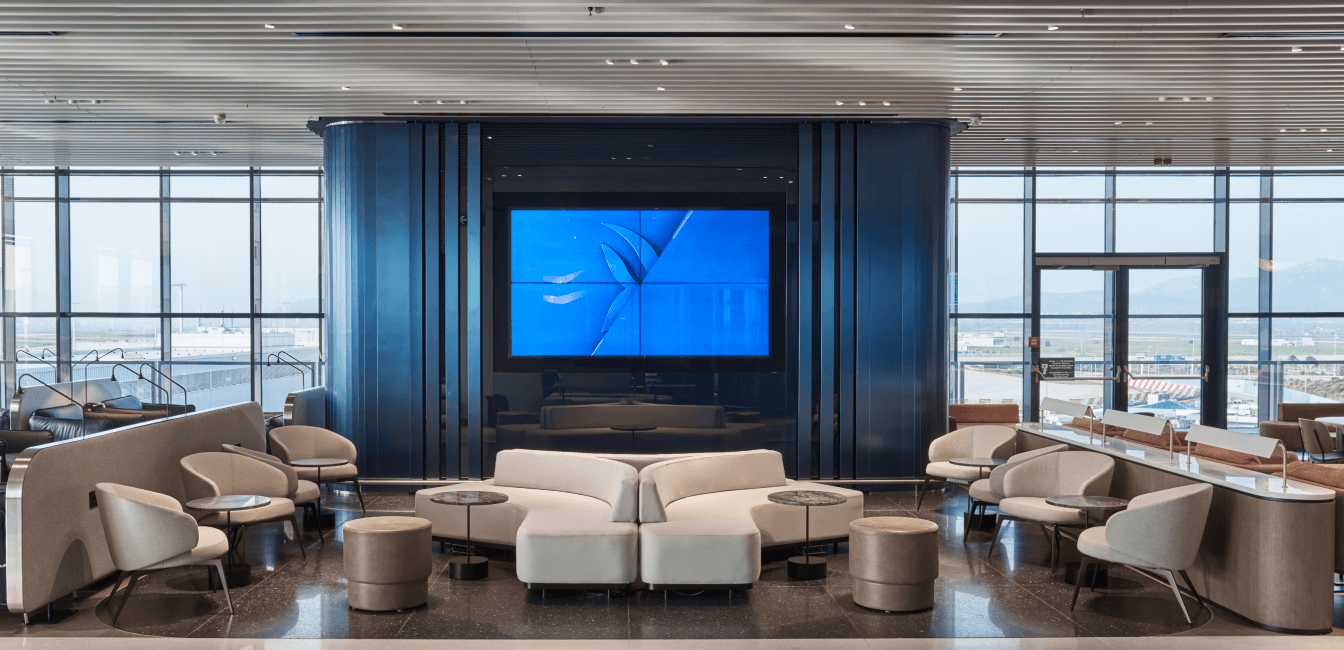 Business lounge area with large screen