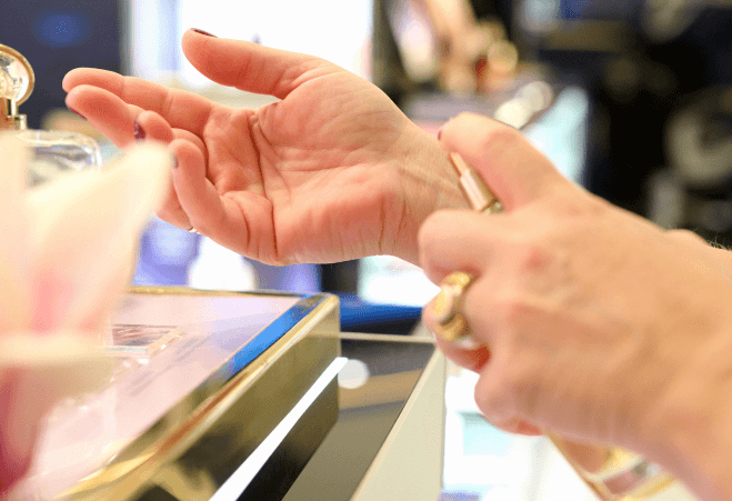Perfume sampling at duty-free shops in Athens International Airport